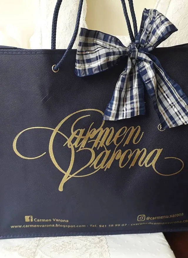 Carmen Varona Moda Infantil bolsa azul de empresa con lazo cuadros